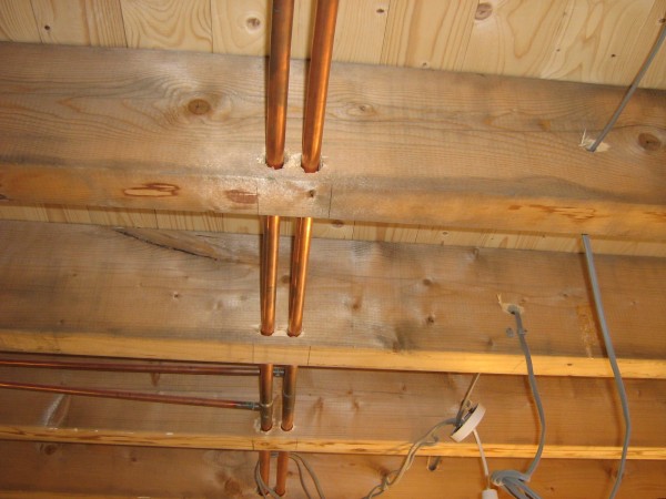 holes or notches in timber floor joists